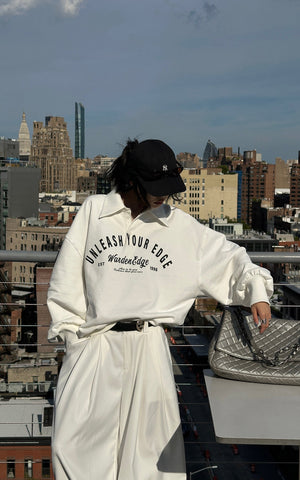 Oversized Polo Sweatshirt with Bold Graphic Print and Streetwear Edge