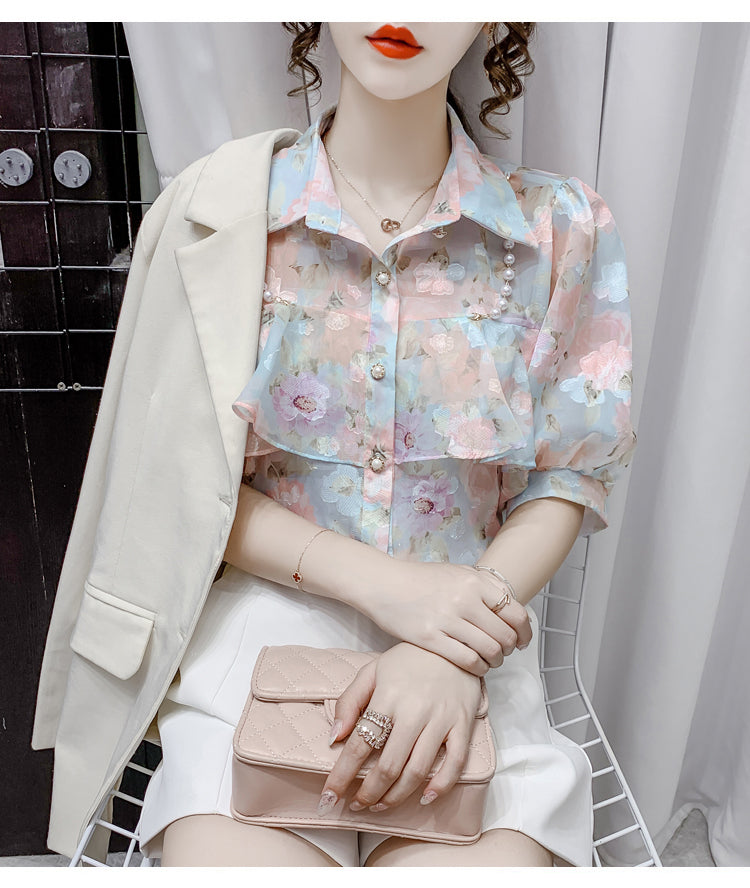 Blusa de gasa con volantes y cuentas de perlas 