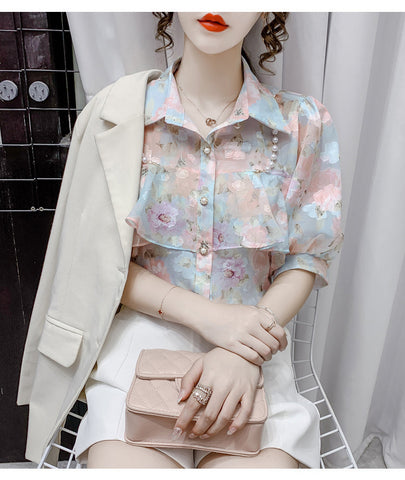 Blusa de gasa con volantes y cuentas de perlas 
