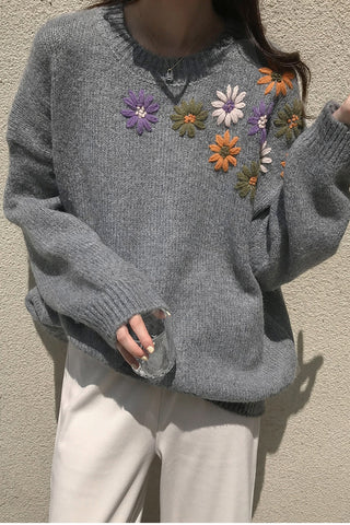 Eleganter Strickpullover mit Blumenstickerei und Rundhalsausschnitt