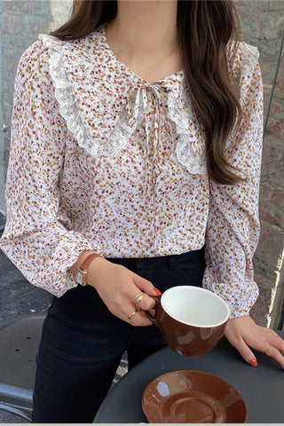 Blusa de manga larga con cuello Peter Pan y estampado floral