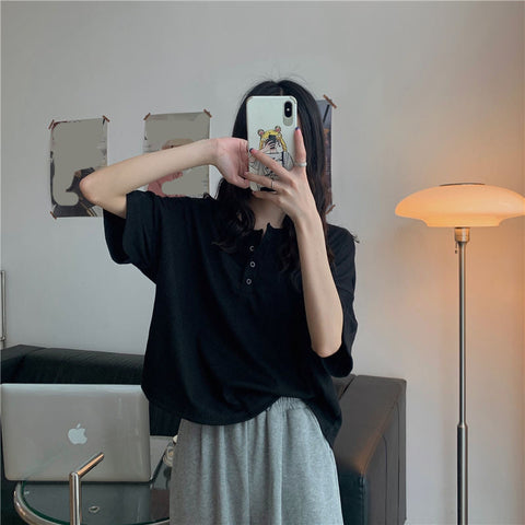 Camisa básica holgada y corta 