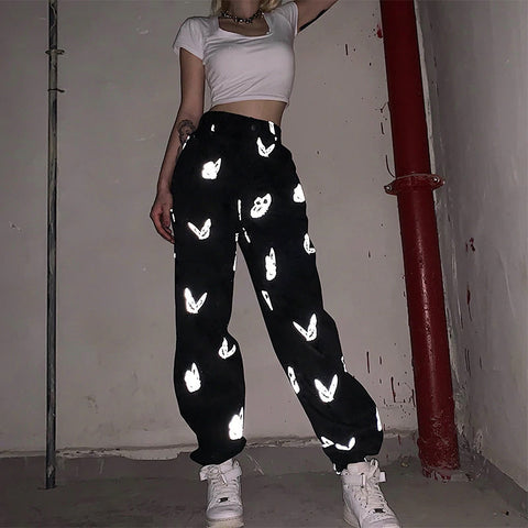 Pantalones deportivos con estampado reflectante de mariposas