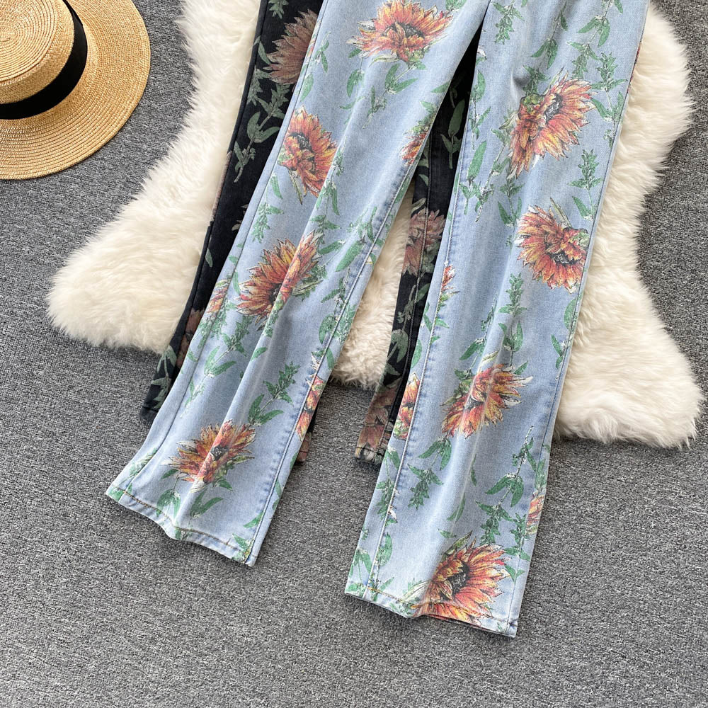 Pantalones vaqueros largos con estampado de girasoles 