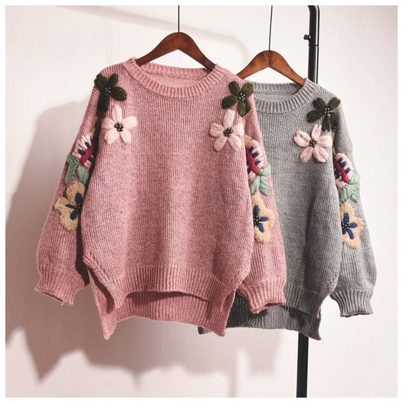 Eleganter Strickpullover mit Blumenstickerei 