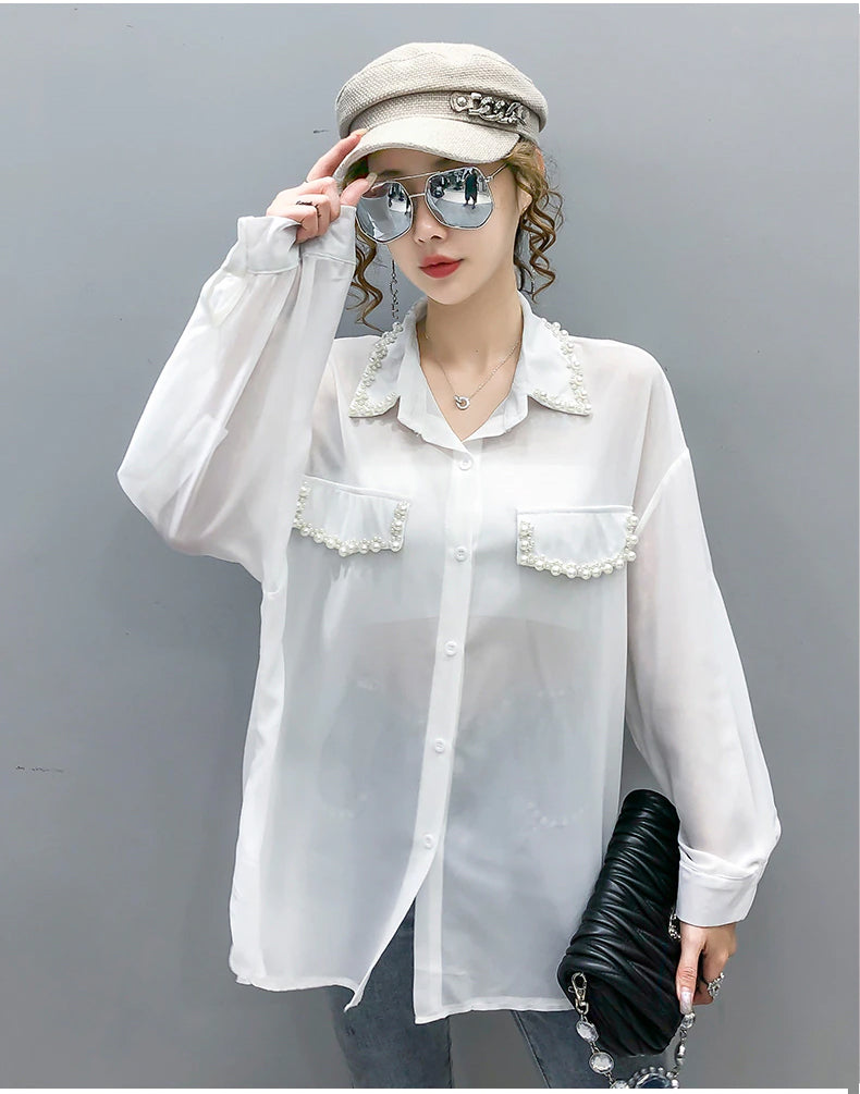 Blusa de gasa con cuentas y mangas largas 