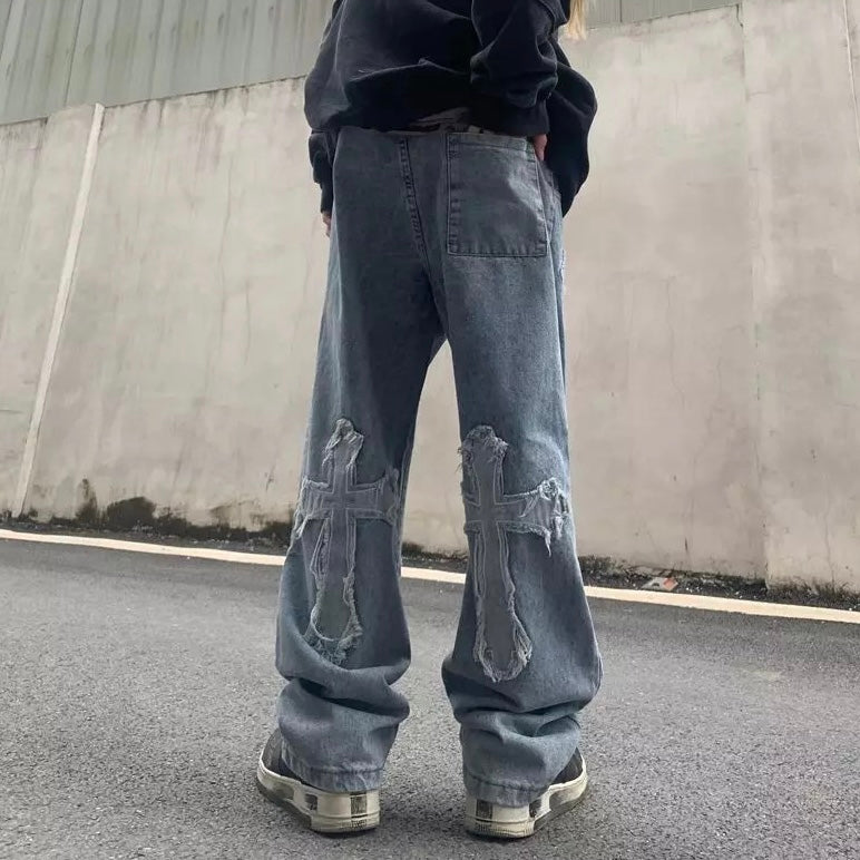 Jeans mit gekreuzten Patches 