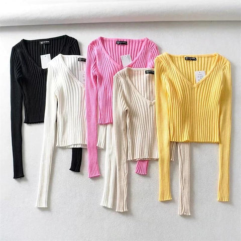 Suéter de punto ajustado con cuello en V y ribete de canalé