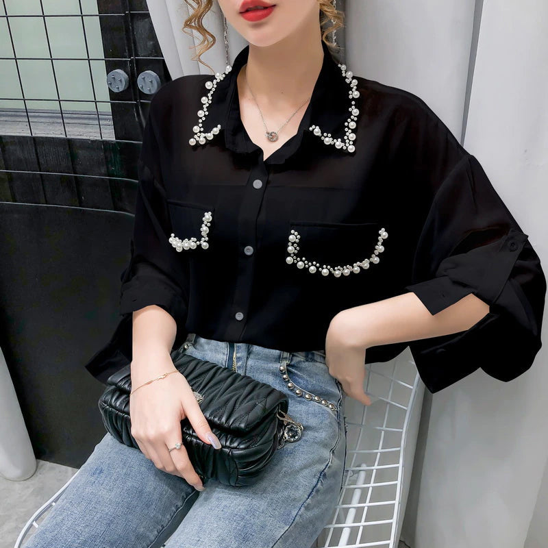 Blusa de gasa con cuentas y mangas largas 