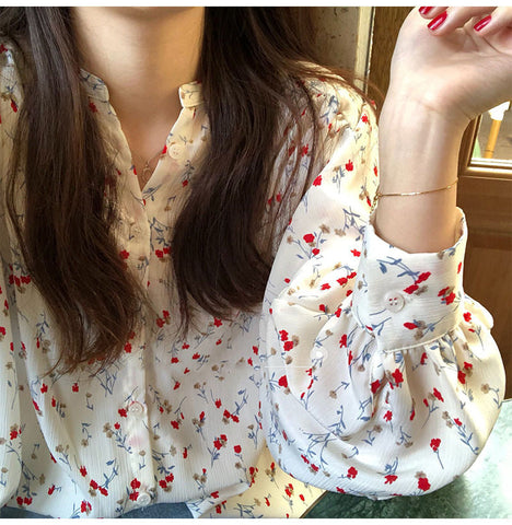 Camisa elegante con estampado floral y cuello en V 