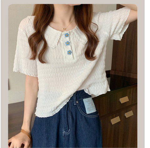 Camisa casual ajustada con botones de flores lindas 