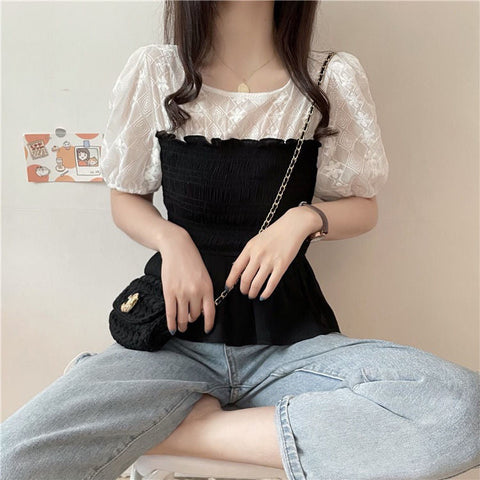 Camisa tipo blusa de dos estilos con mangas abullonadas 