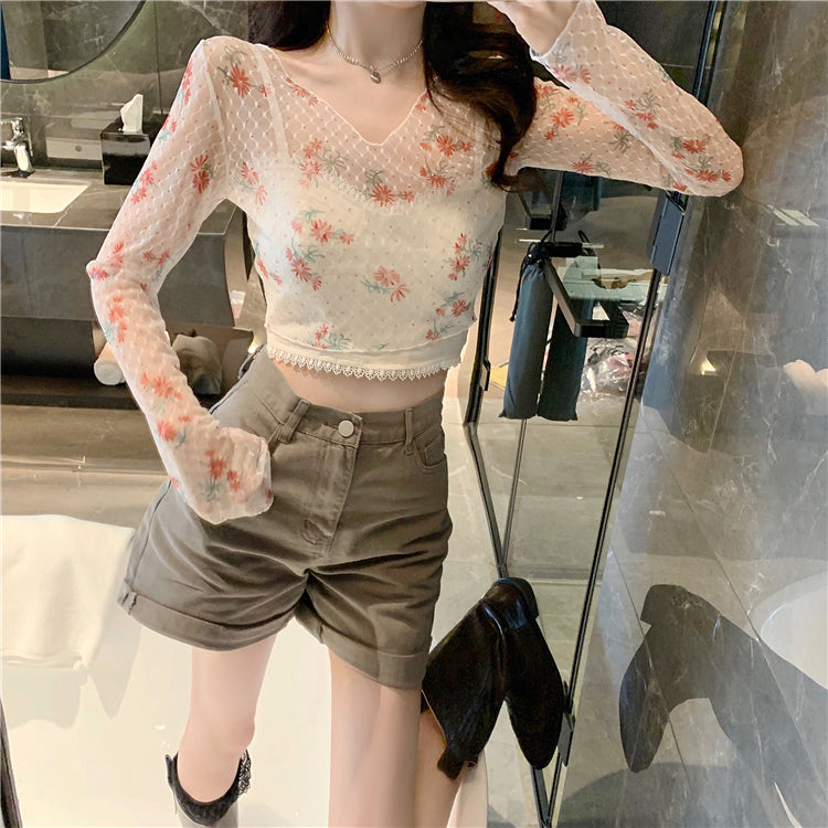 Blusa corta transparente con estampado floral de manga larga 
