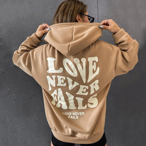 Sudadera con capucha estética "El amor nunca falla"