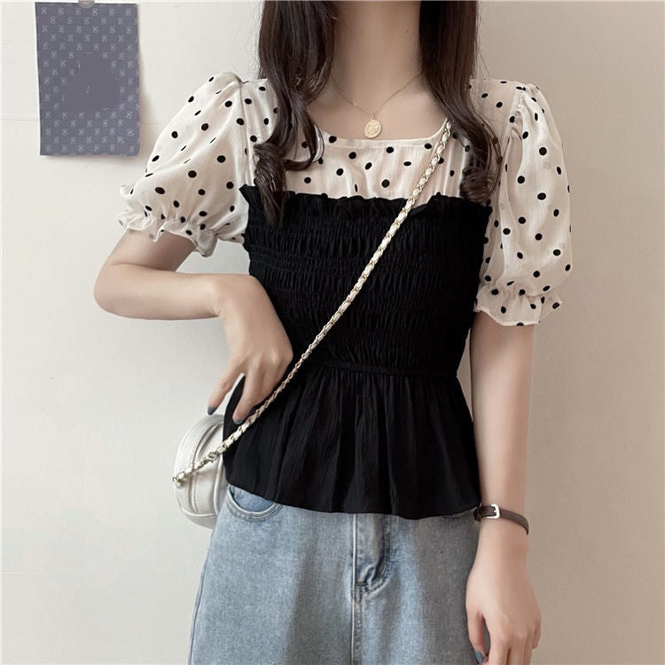 Camisa tipo blusa de dos estilos con mangas abullonadas 