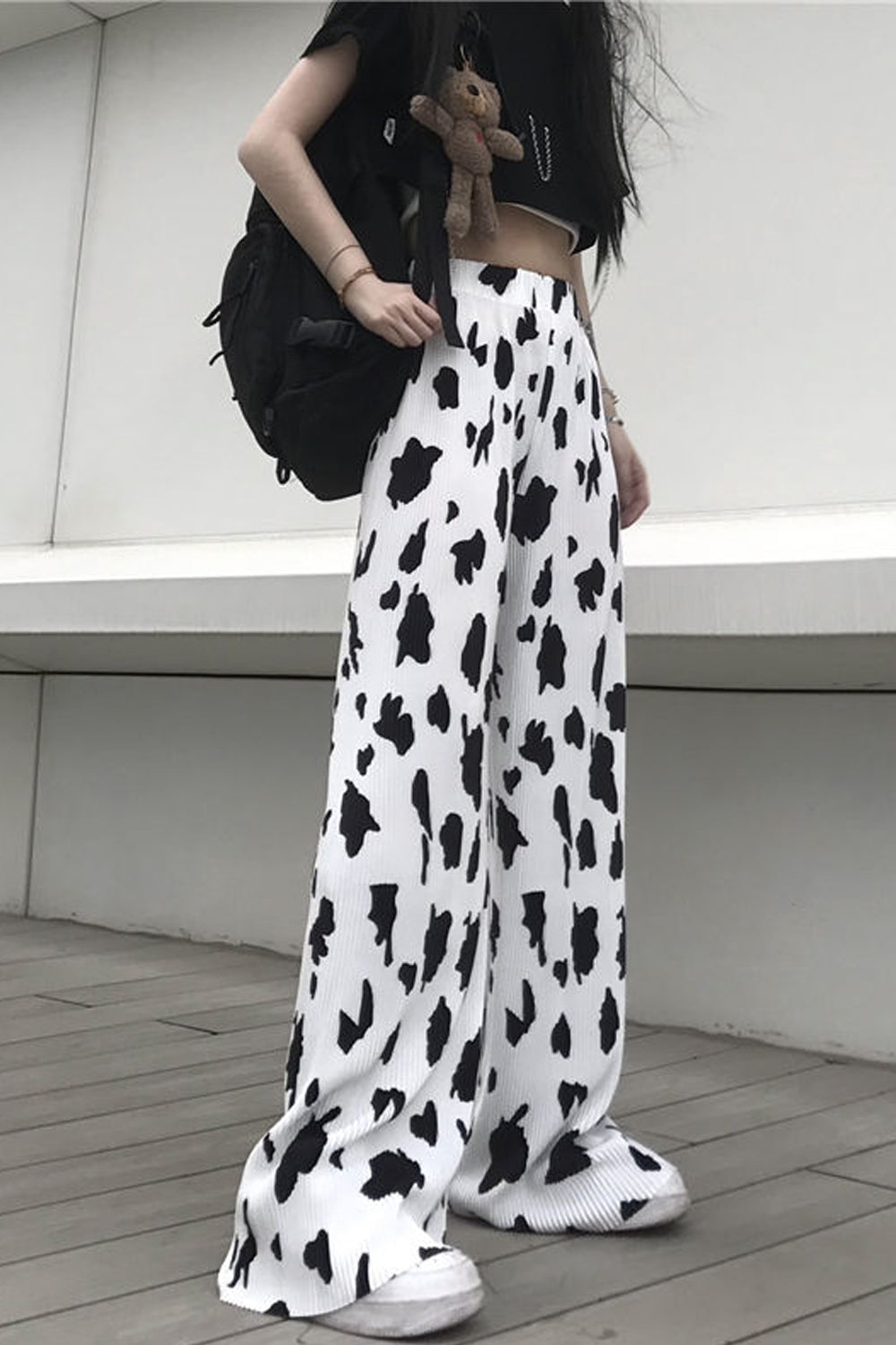 Pantalones largos de cintura alta con estampado de vaca lechera 