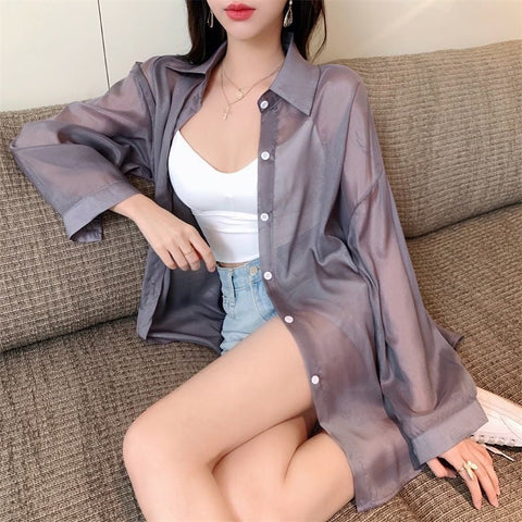 Blusa sexy transparente de manga larga 