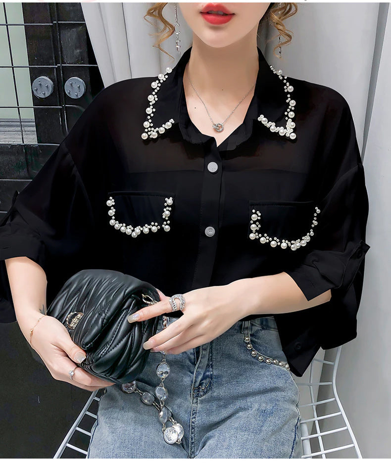 Blusa de gasa con cuentas y mangas largas 