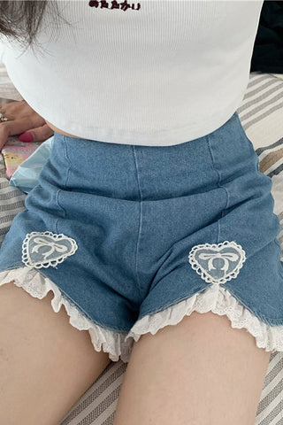 Sexy Jeansshorts mit hoher Taille und unregelmäßiger Spitze