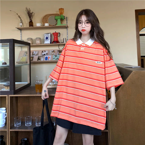 Camisa de cuello polo de rayas sueltas de colores 