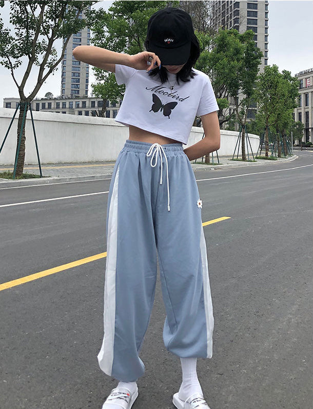 Pantalones deportivos con bordado de flores de margaritas