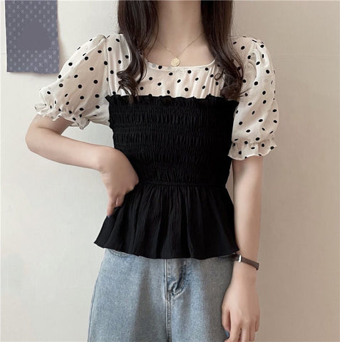 Camisa tipo blusa de dos estilos con mangas abullonadas 
