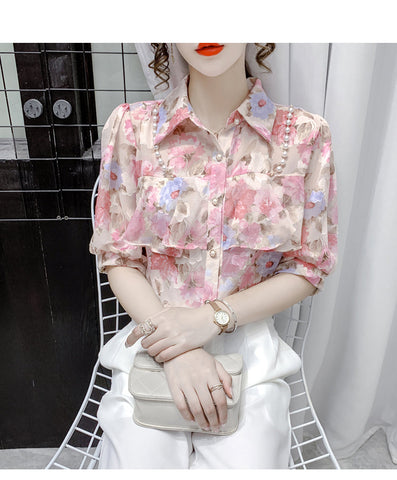 Blusa de gasa con volantes y cuentas de perlas 