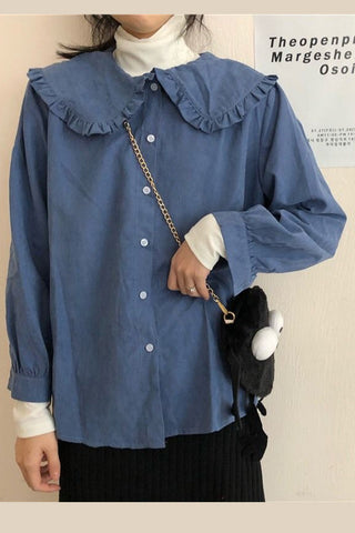 Blusa lisa con cuello Peter Pan