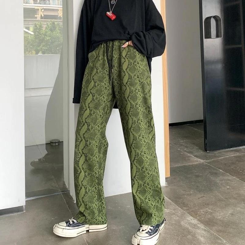 Pantalones de cintura alta con estampado de serpiente serpentina