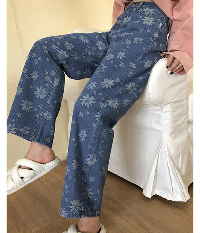 Jeanshose mit weitem Bein und Sonnenblumen-Print