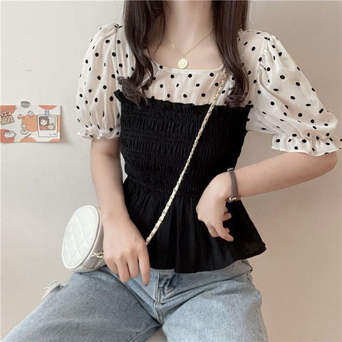 Camisa tipo blusa de dos estilos con mangas abullonadas 