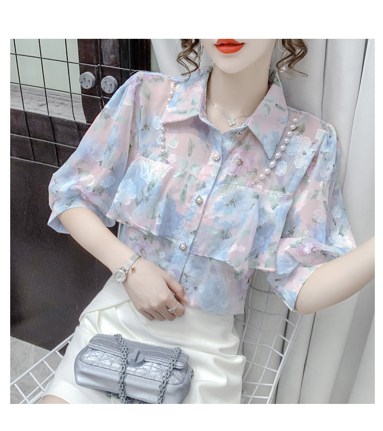 Blusa de gasa con volantes y cuentas de perlas 