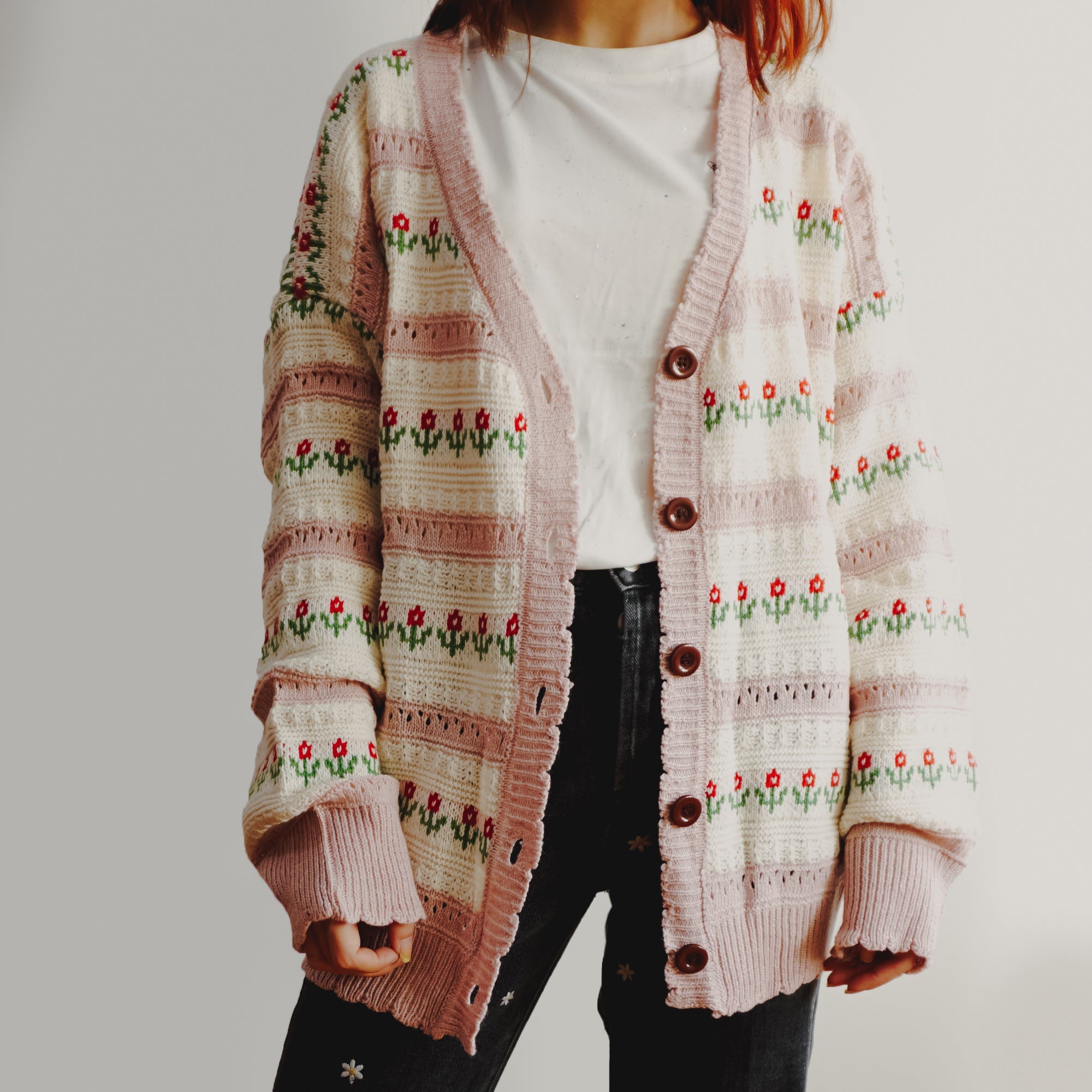 Strickjacke mit Blumenstreifen