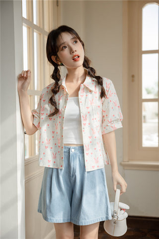 Camisa corta con botones de conejito rosa