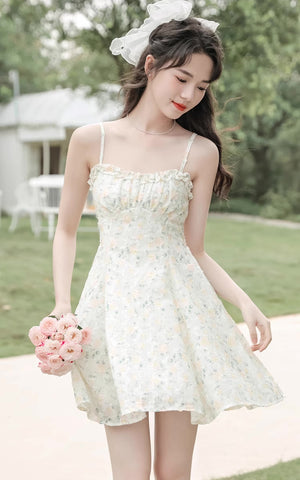 Vestido mini de tirantes con rosa descolorido