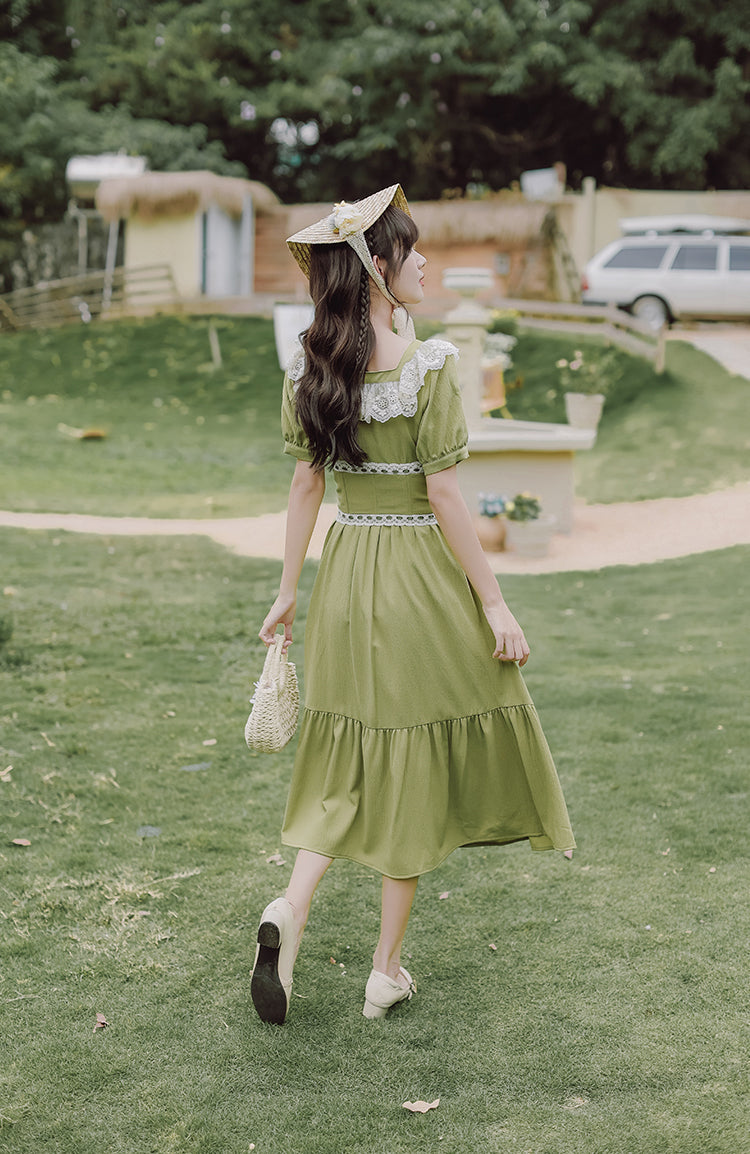 Vestido midi con corsé y margaritas de color matcha