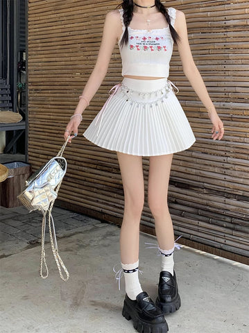 Mini-Faltenrock mit Sternkette