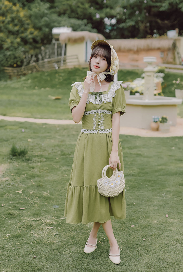 Vestido midi con corsé y margaritas de color matcha