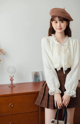 Ruffle Trim Tie Neck Blouse