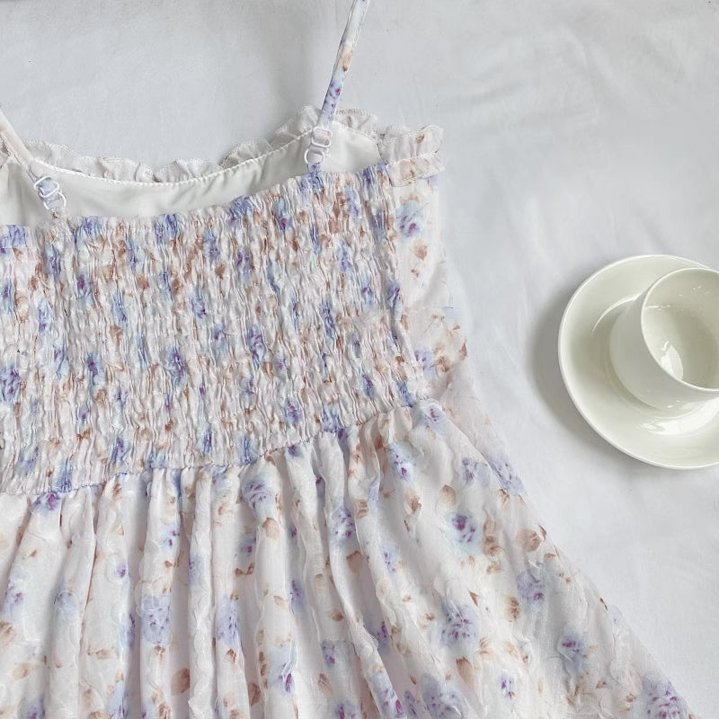 Vestido mini de tirantes con rosa descolorido