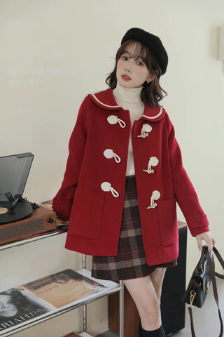 Abrigo tipo trenca con cuello Peter Pan y botones