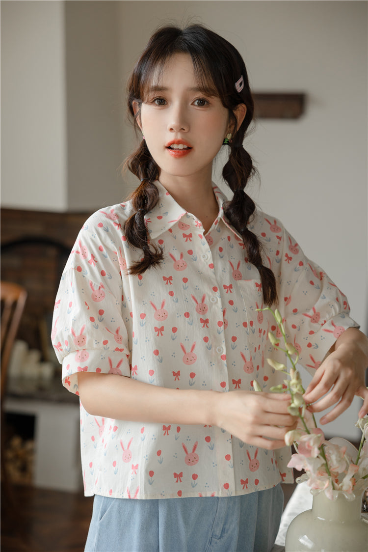 Camisa corta con botones de conejito rosa