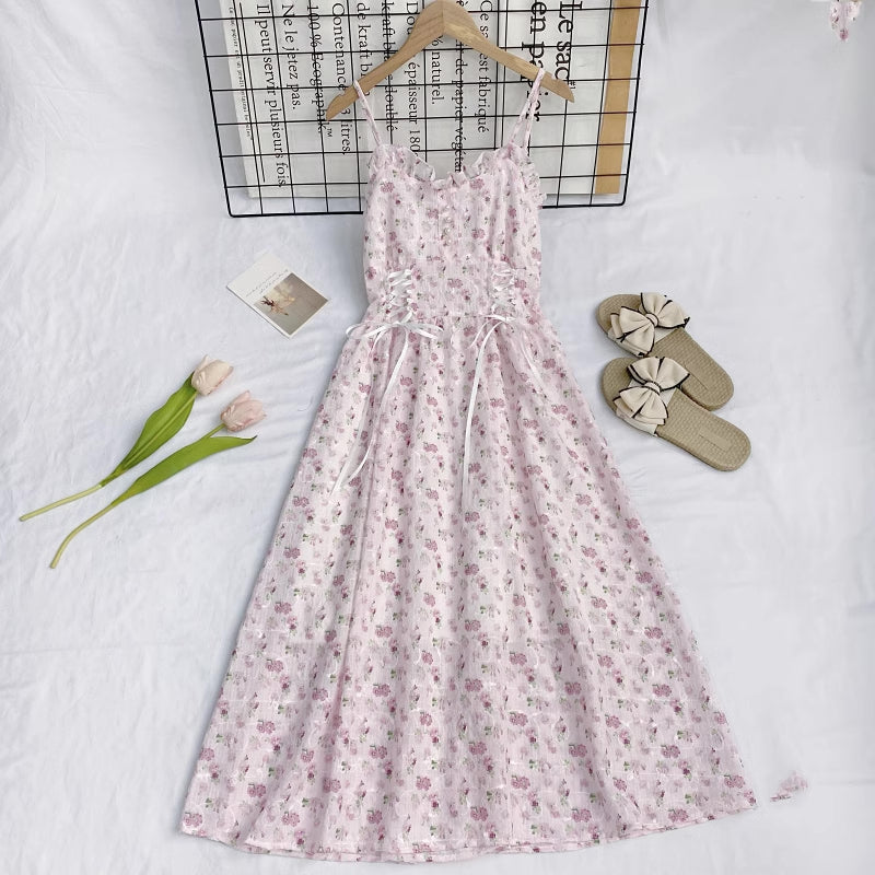 Vestido camisola con cordones y flores de mayo