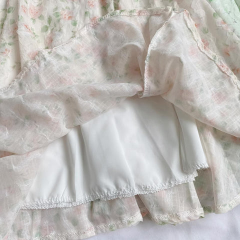 Vestido mini de tirantes con rosa descolorido