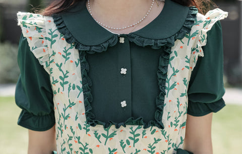 Vestido dos piezas con pechera y capullos de flores