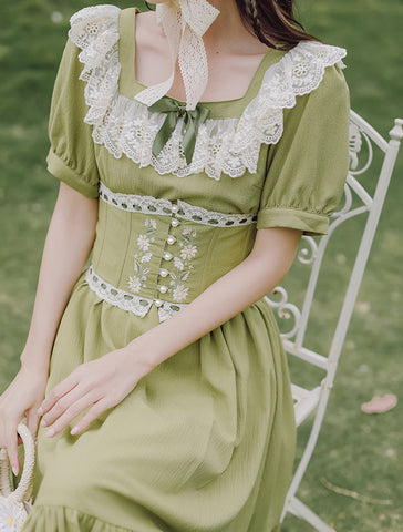 Vestido midi con corsé y margaritas de color matcha