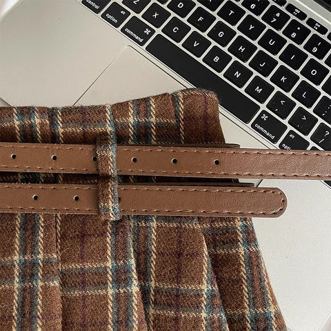 Muskatnussfarbener Mini-Faltenrock mit Karomuster