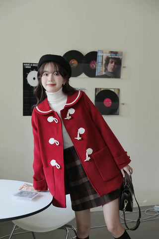 Abrigo tipo trenca con cuello Peter Pan y botones