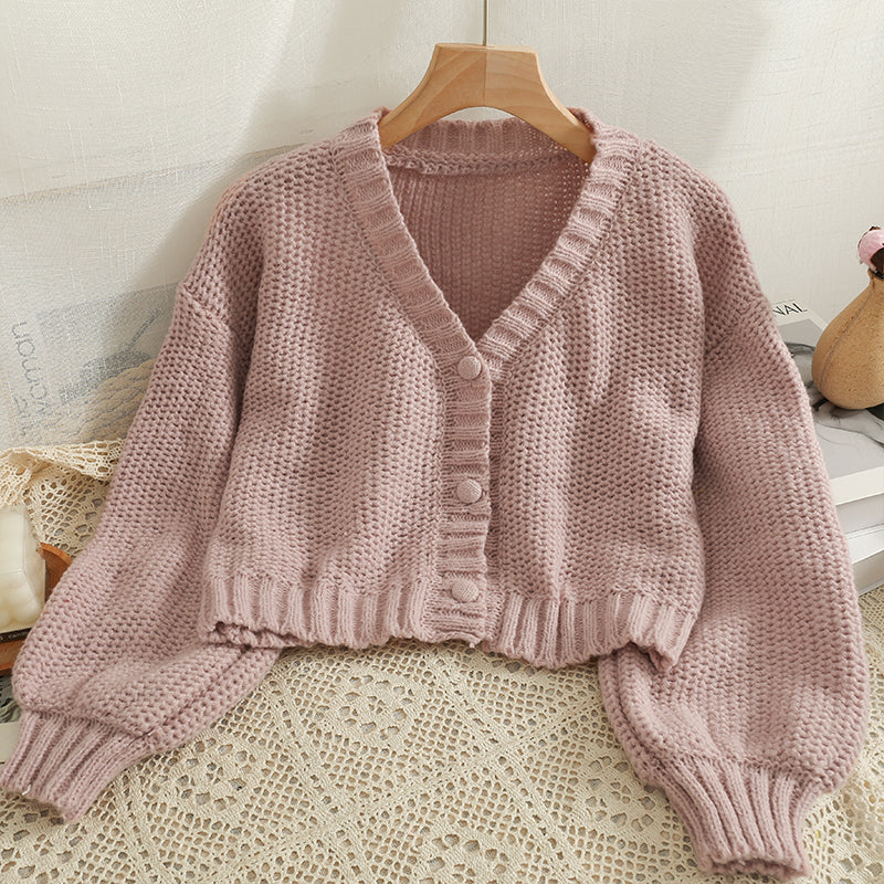 Kurze Baby-Strickjacke