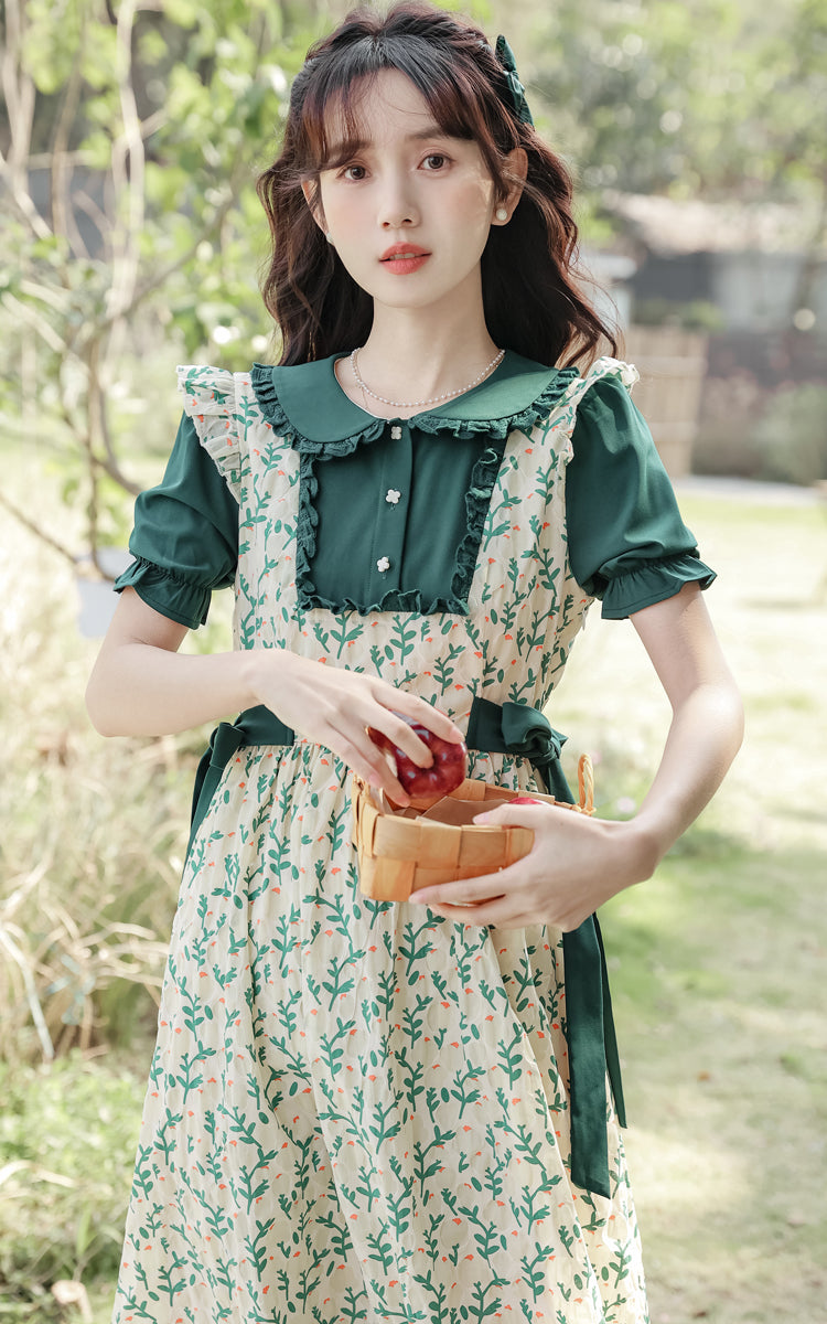 Vestido dos piezas con pechera y capullos de flores